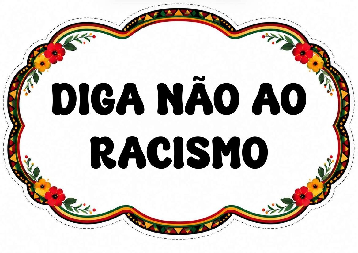 Plaquinha “Diga não ao racismo” em letras pretas, com fundo branco e moldura colorida com flores.